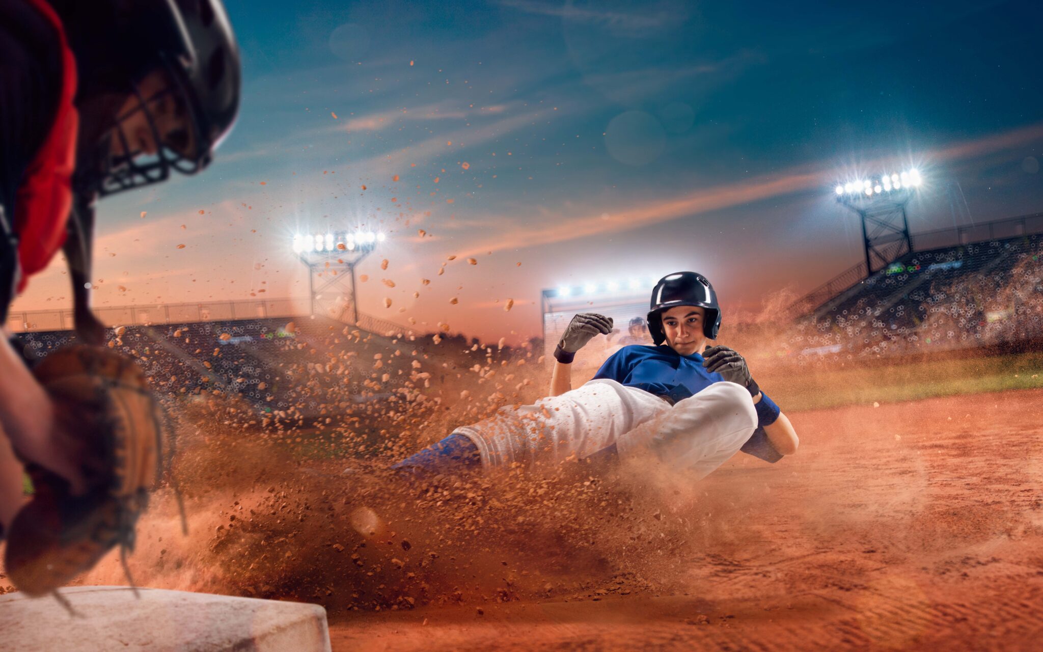 baseball explained for beginners – runner slides into home plate during game